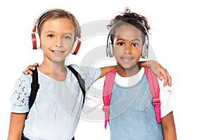 Schoolkids listening music in wireless headphones