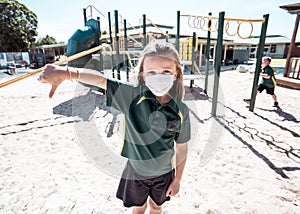 Schools closures Coronavirus lockdown. Bored school kid alone in playground feeling sad and lonely