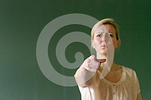 Schoolteacher pointing with her finger