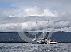 Schooner rigged motor sailer in the bay