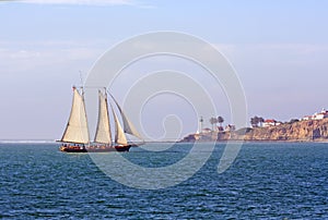 Schooner sails past Point Loma near San Diego, Cal