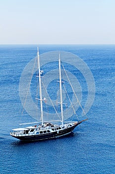 Schooner yacht in blue sea