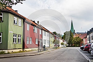 The Schultz gate St and their wooden colored buildings at the city centr of Trondheim, Norway photo
