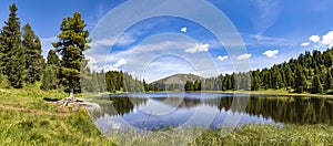 Schwarzsee in Carinthia, the three lakes circuit Turracher Hoehe in Austria, a panorama.