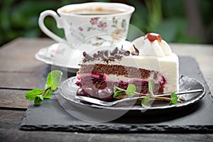 Schwarzwald cake, Black Forest cake and cup of coffee photo