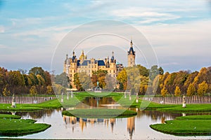 Schwerin castle seen from the park with colored foliage