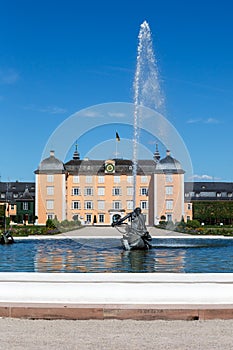 Schwetzingen Castle with fountain in a garden park architecture travel portrait format in Germany