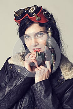 Sci fi dieselpunk or steampunk girl with aviator goggles