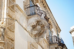 Scicli, Palazzo Beneventano: the screams of stone photo