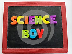 Science boy written on a chalkboard