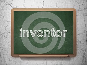 Science concept: Inventor on chalkboard background