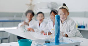 Science, experiment and chemical reaction with kids in a classroom at school for education or development. Learning, wow