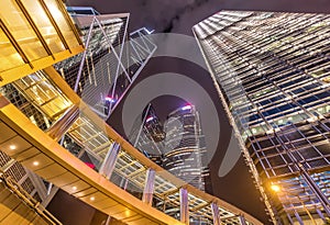 Science Fiction Style Glass & Steel Skyscrapers and Bridge with Reflections at Night, Hong Kong