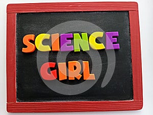 Science girl  written on a chalkboard