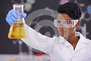 Science, laboratory and black woman with sample in beaker for medical research, analysis and vaccine development