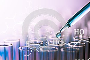 Science laboratory test tubes with chemical formula on screen ,