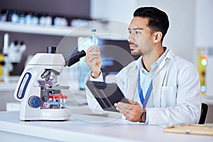 Science, microscope and man with sample and tablet in laboratory for research, test and analysis. Healthcare