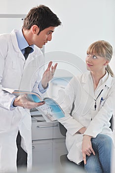 Science people in bright lab