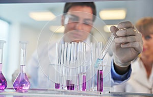 Science people in bright lab