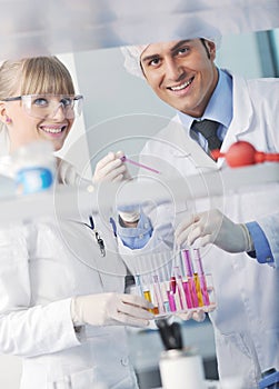 Science people in bright lab