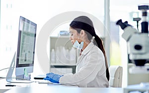 Science, research and woman with computer typing medical study, online report or exam results. Website, writing and