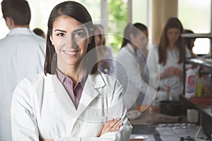 Science students working with chemicals in the lab at the university.Happy student, content for experimental results