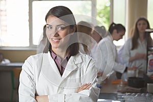 Science students working with chemicals in the lab at the university. Happy student, content for experimental results