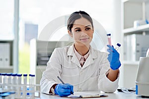 Science, woman and lab with test tube for thinking, scientist and microbiologist with research and vaccine study. Career