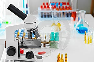 Scientific healthcare research background with microscope in medical laboratory