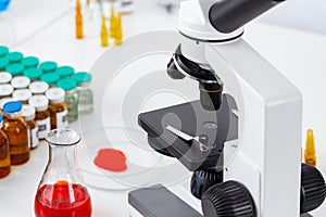 Scientific healthcare research background with microscope in medical laboratory