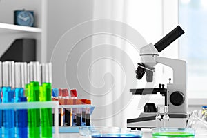 Scientific healthcare research background with microscope in medical laboratory