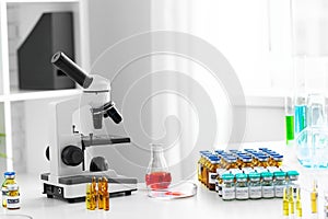 Scientific healthcare research background with microscope in medical laboratory