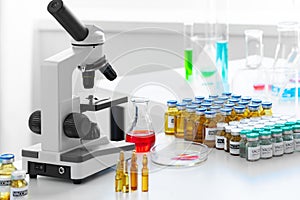 Scientific healthcare research background with microscope in medical laboratory