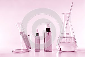 Scientific laboratory experimental glassware with clear solution.