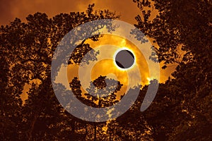 Scientific natural phenomenon. Total solar eclipse glowing on sk photo
