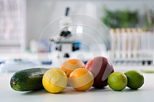 Scientific tools and fruits at workplace