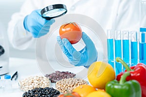 Scientist check chemical food residues in laboratory. Control experts inspect quality of fruits, vegetables. lab, hazards, ROHs,