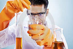 Scientist with chemicals