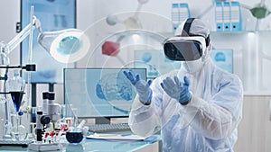 Scientist chemist doctor wearing virtual reality headset analyzing brain waves