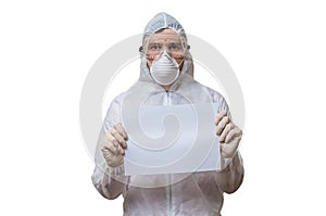 Scientist in coveralls is holds blank paper for custom text.