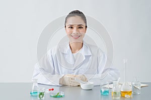 The scientist, dermatologist formulate organic natural cosmetic product in the laboratory