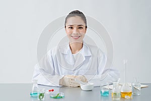 The scientist, dermatologist formulate organic natural cosmetic product in the laboratory photo