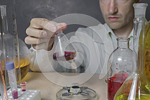 A scientist is doing his chemical lab research