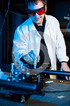 Scientist doing research in a quantum optics lab