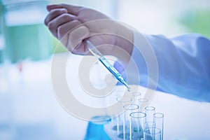 Scientist doing a test in a biological laboratory.