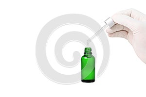 Scientist dropping chemical liquid to flask , Laboratory research concept,Researcher is dropping the reagent into test