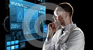 Scientist in goggles looking at virtual screen
