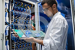 Scientist Holding Blade Server