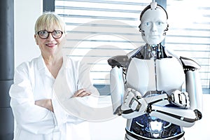 Scientist and humanoid robot work together