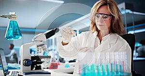 Scientist In Lab Doing Pharmaceutical Research